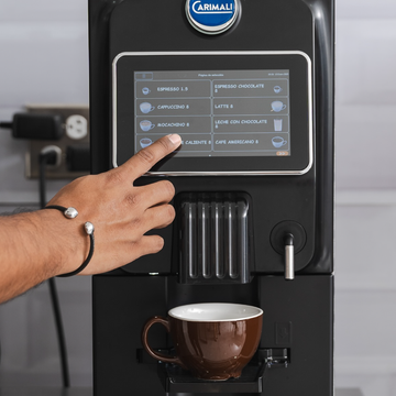 cafesti automatic coffee machine and milk accessory shown with cafesti signature beans  